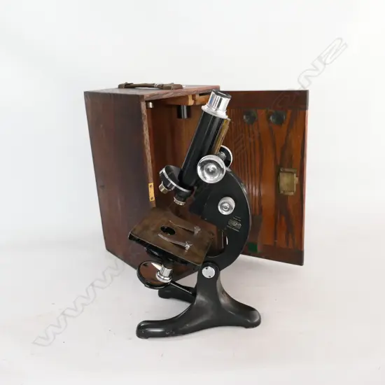 OAK CASED MICROSCOPE by R & J BECK LTD., LONDON . MODEL 29, LACQUERED & CHROMED BRASS.